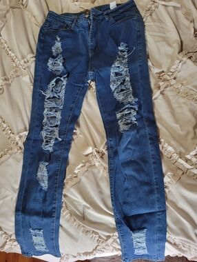 Women’s Distressed Dark Blue Ripped Jeans